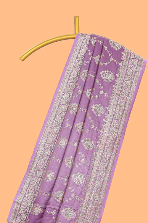 Lavender floral designed banarasi silk saree with self floral border and matching blouse