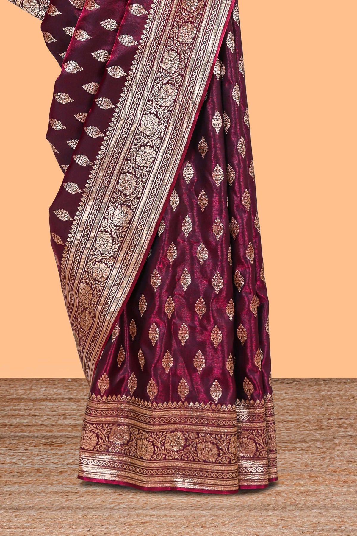 Deep plum butta designed banarasi silk saree with self zari border and matching blouse