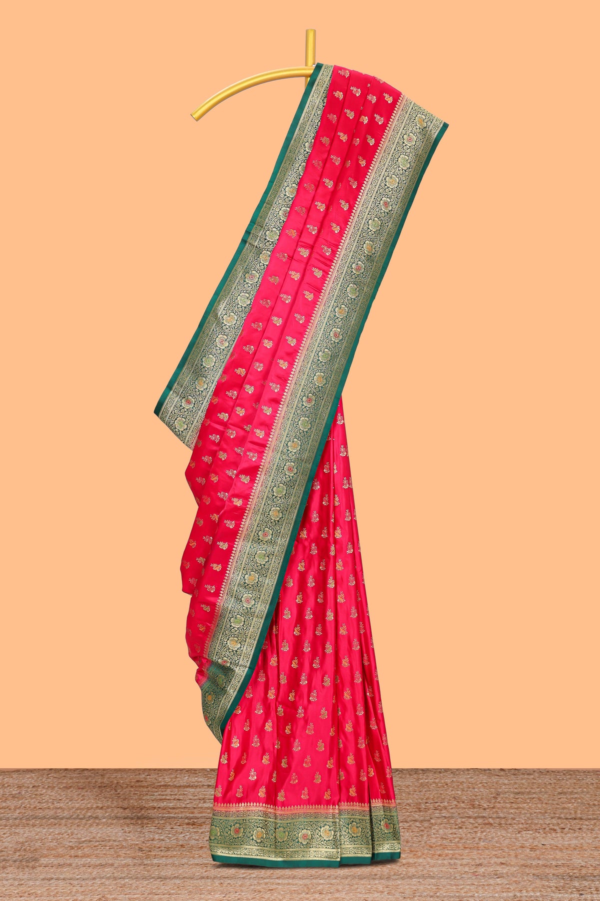 Bright red butta designed banarasi silk saree with contrast zari border and  blouse