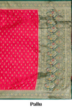 Bright red butta designed banarasi silk saree with contrast zari border and  blouse