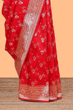 Red floral designed banarasi silk saree with self zari border and  matching blouse