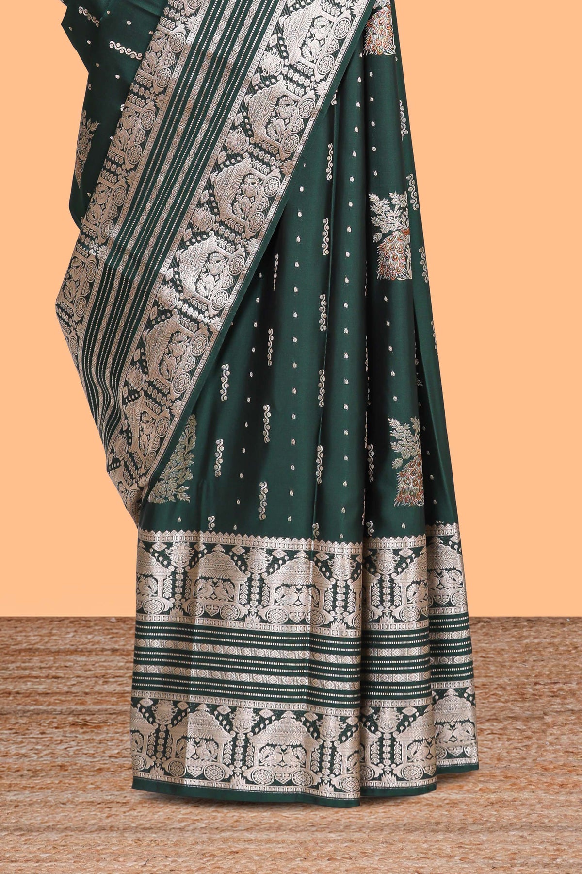 dark green unique designed banarasi silk saree with self zari border and  matching blouse