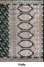 dark green unique designed banarasi silk saree with self zari border and  matching blouse