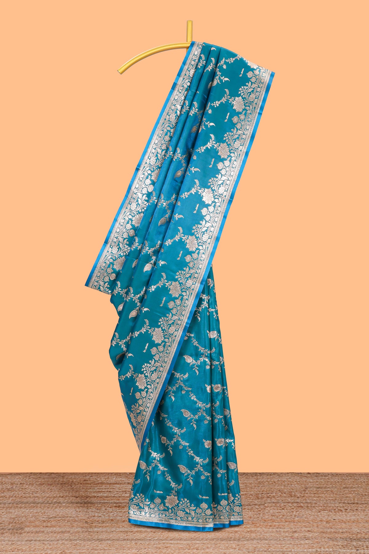 Blue floral designed banarasi silk saree with self zari border and  matching blouse