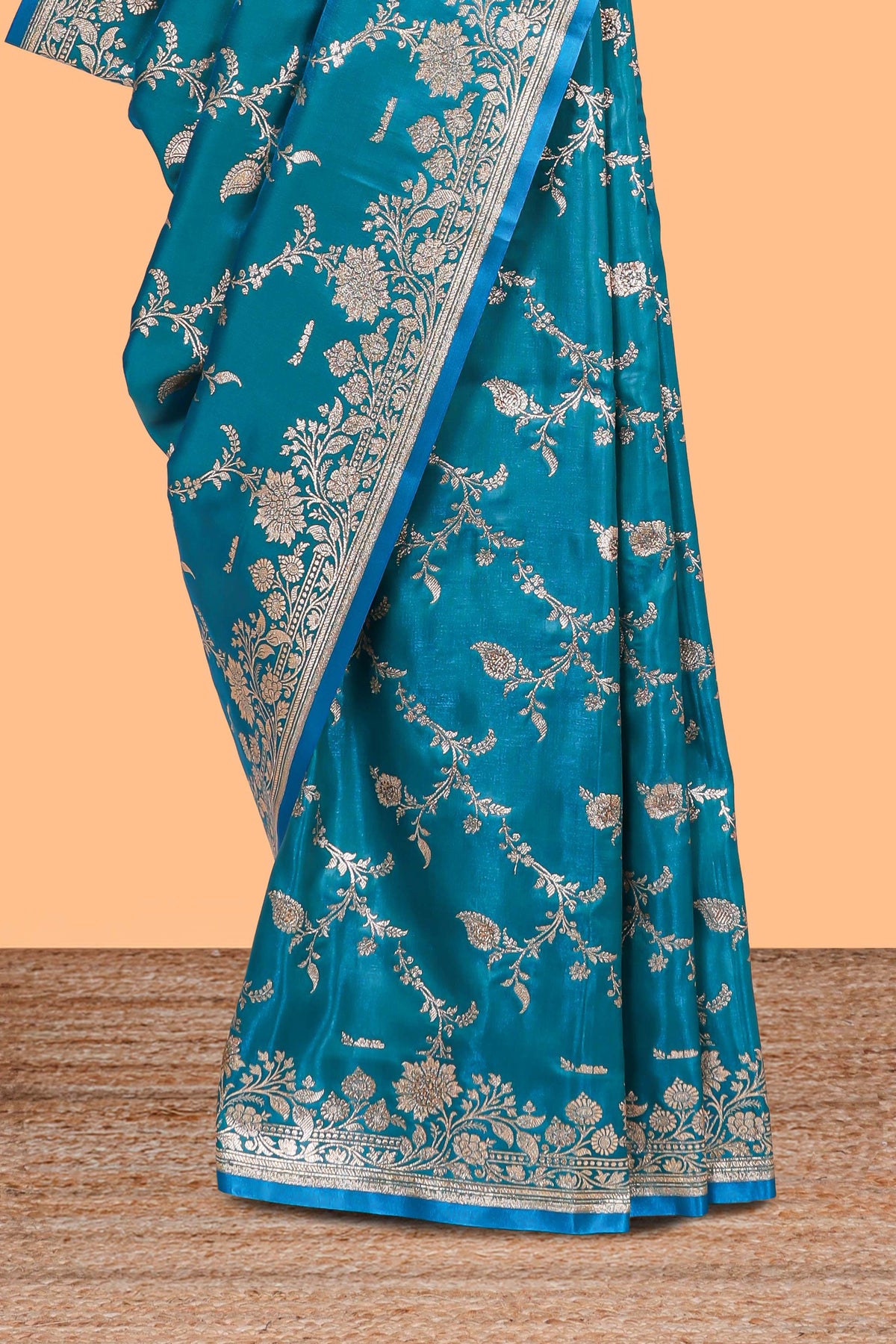 Blue floral designed banarasi silk saree with self zari border and  matching blouse