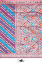 Multicolor chevron designed banarasi silk saree with contrast traditional zari border and matching blouse