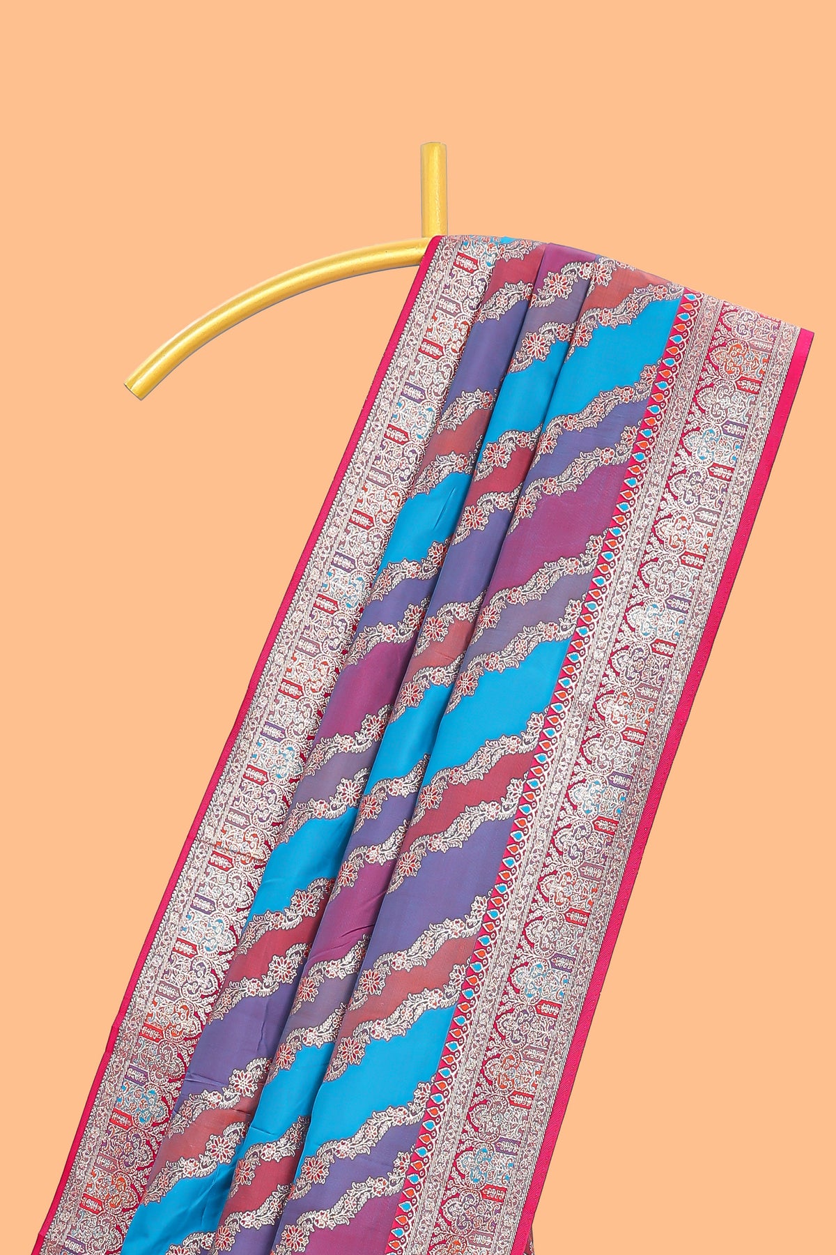 Multicolor chevron designed banarasi silk saree with contrast traditional zari border and matching blouse