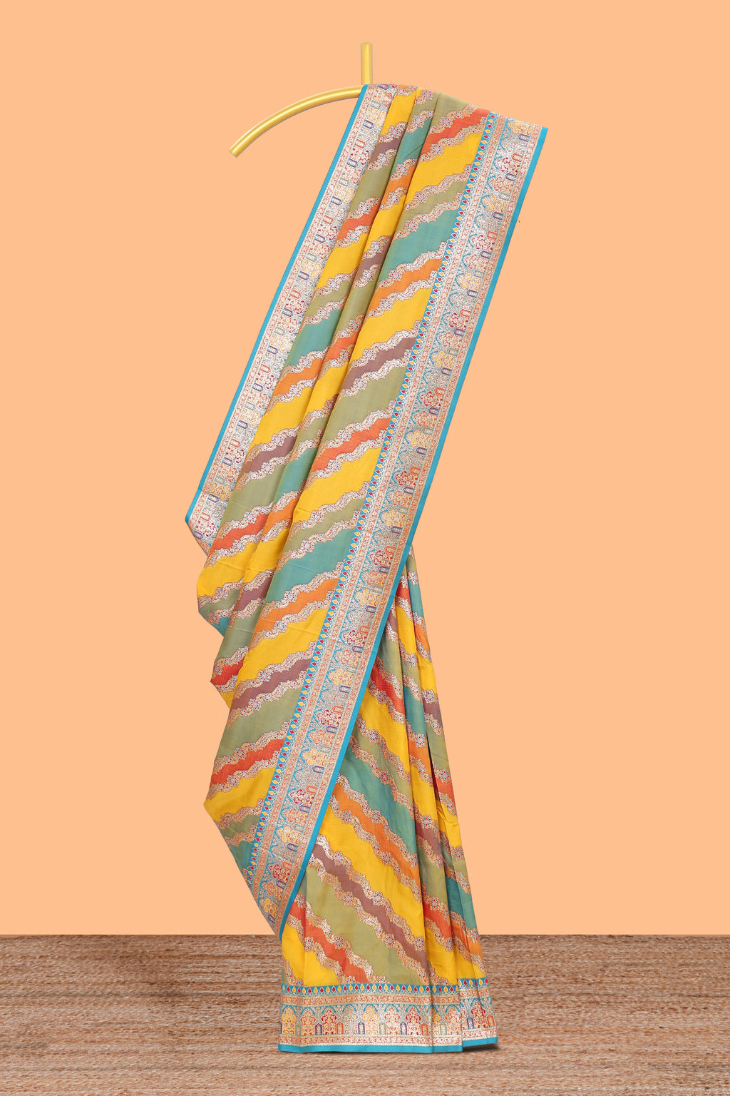 Multicolor chevron designed banarasi silk saree featuring intricate contrast zari border and matching Blouse