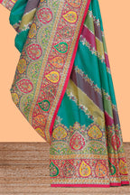 Multicolor floral vines banarasi silk saree featuring contrast floral and paisley motifs border and blouse