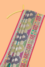 Multicolor traditional grid pattern banarasi silk saree with intricate contrast zari border and matching blouse