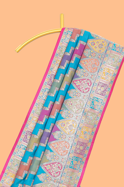 Multicolor geometric pattern banarasi silk saree with intricate contrast floral border and blouse