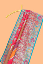 Multicolor floral vines designed banarasi silk saree with intricate contrast floral border and blouse