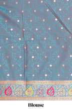 Multicolor floral vines designed banarasi silk saree with intricate contrast leaf motifs border and blouse