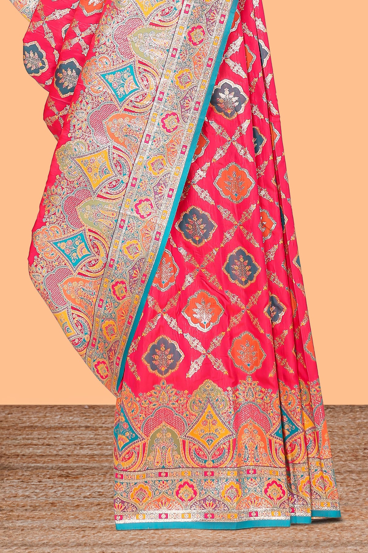 Bright red geometric tile pattern banarasi silk saree with intricate contrast zari border and blouse
