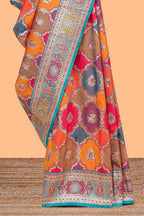 Multicolor geometric grid patter banarasi silk saree with intricate contrast zari border and blouse