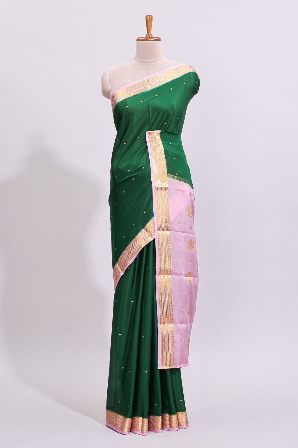 Green zari motifs design pure mysore silk saree with contrast border and zari motifs blouse
