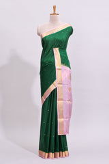 Green zari motifs design pure mysore silk saree with contrast border and zari motifs blouse