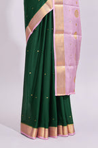 Green zari motifs design pure mysore silk saree with contrast border and zari motifs blouse