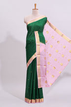Green zari motifs design pure mysore silk saree with contrast border and zari motifs blouse