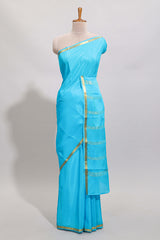 Sky blue plain design pure mysore silk saree with contrast border and matching blouse