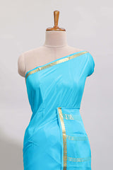 Sky blue plain design pure mysore silk saree with contrast border and matching blouse