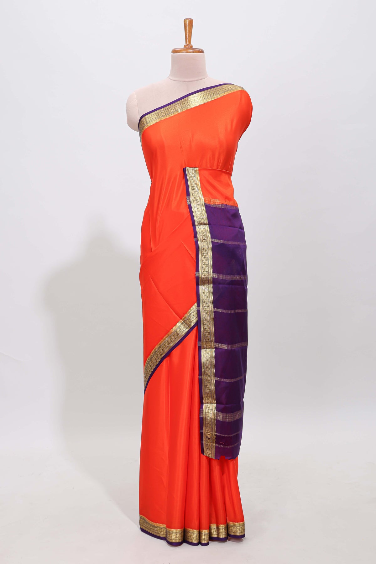 Orange plain pure mysore silk saree with contrast border and blouse