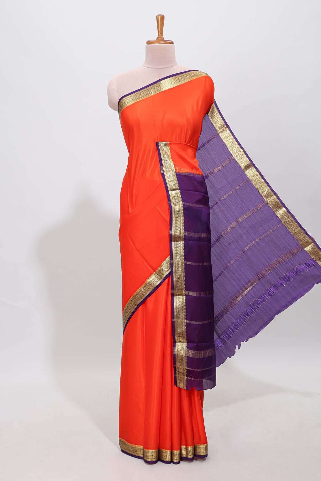 Orange plain pure mysore silk saree with contrast border and blouse