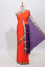 Orange plain pure mysore silk saree with contrast border and blouse
