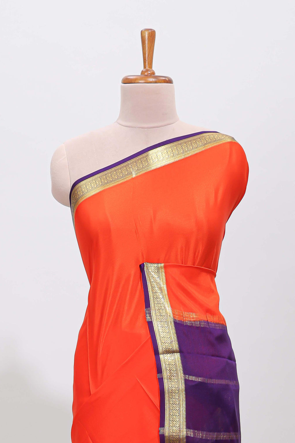 Orange plain pure mysore silk saree with contrast border and blouse