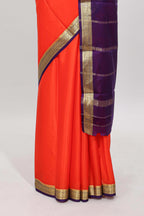 Orange plain pure mysore silk saree with contrast border and blouse