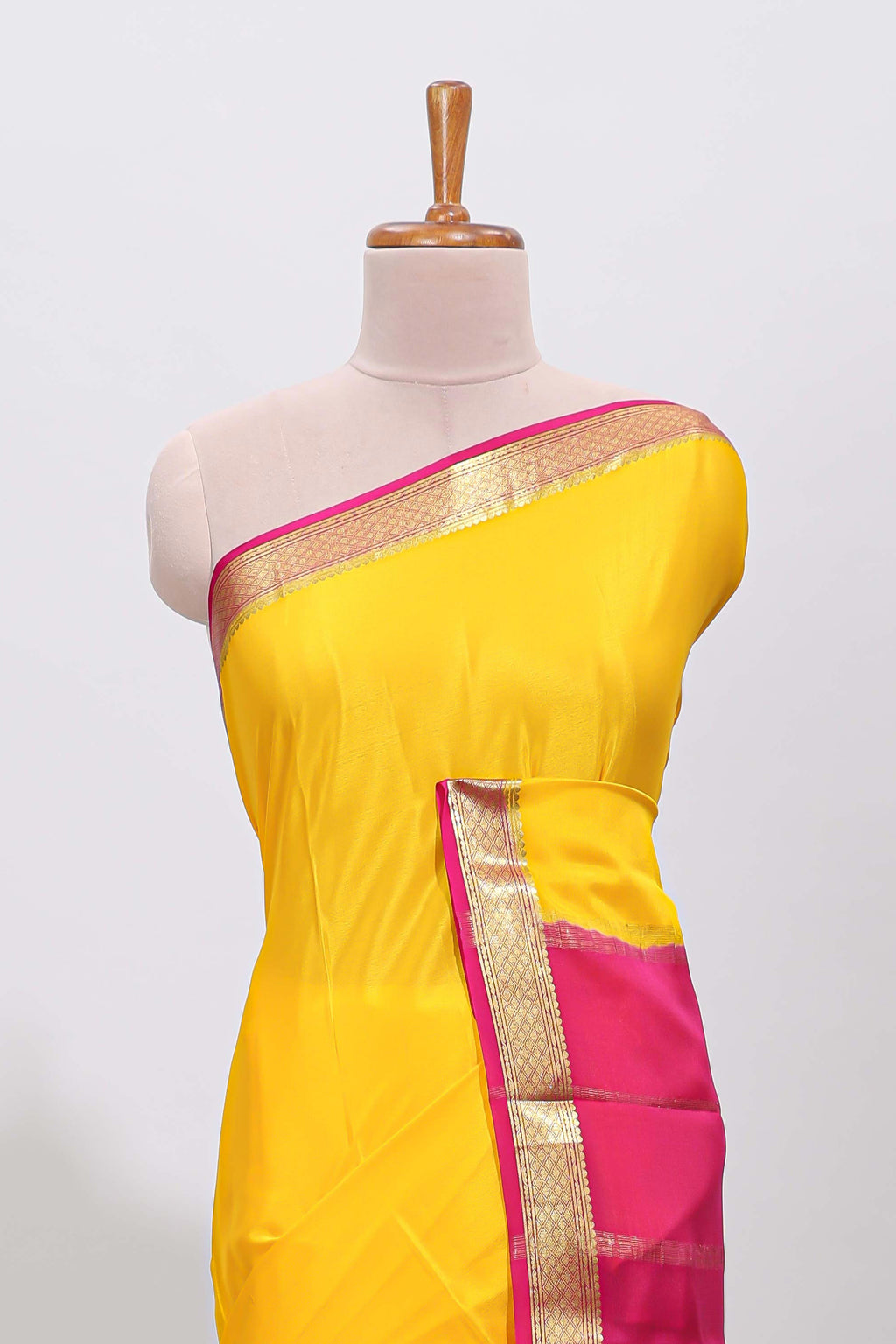 Yellow plain pure mysore silk saree with contrast border and blouse