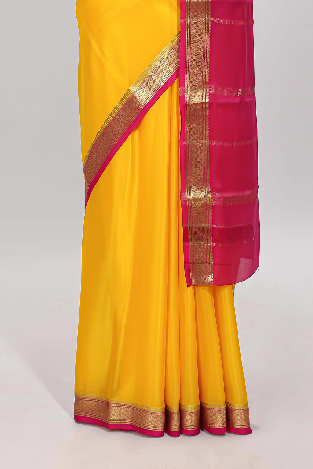 Yellow plain pure mysore silk saree with contrast border and blouse