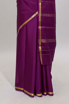 Violet plain pure mysore silk saree with self zari border and matching blouse