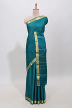 Teal blue plain pure mysore silk saree with self zari border and matching blouse