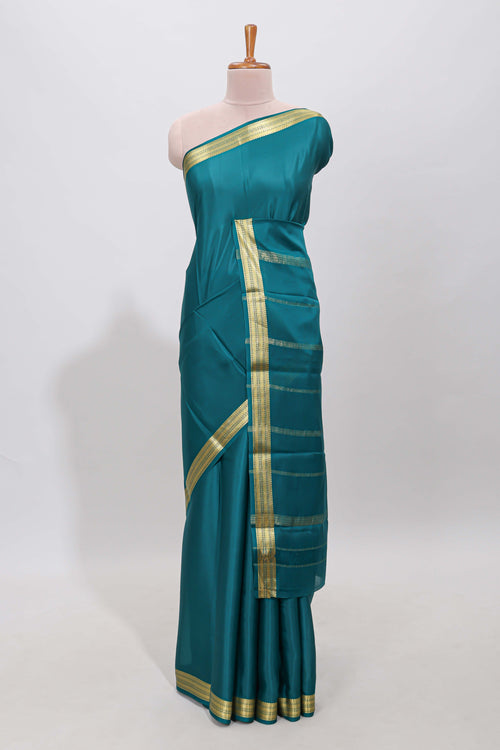 Teal blue plain pure mysore silk saree with self zari border and matching blouse
