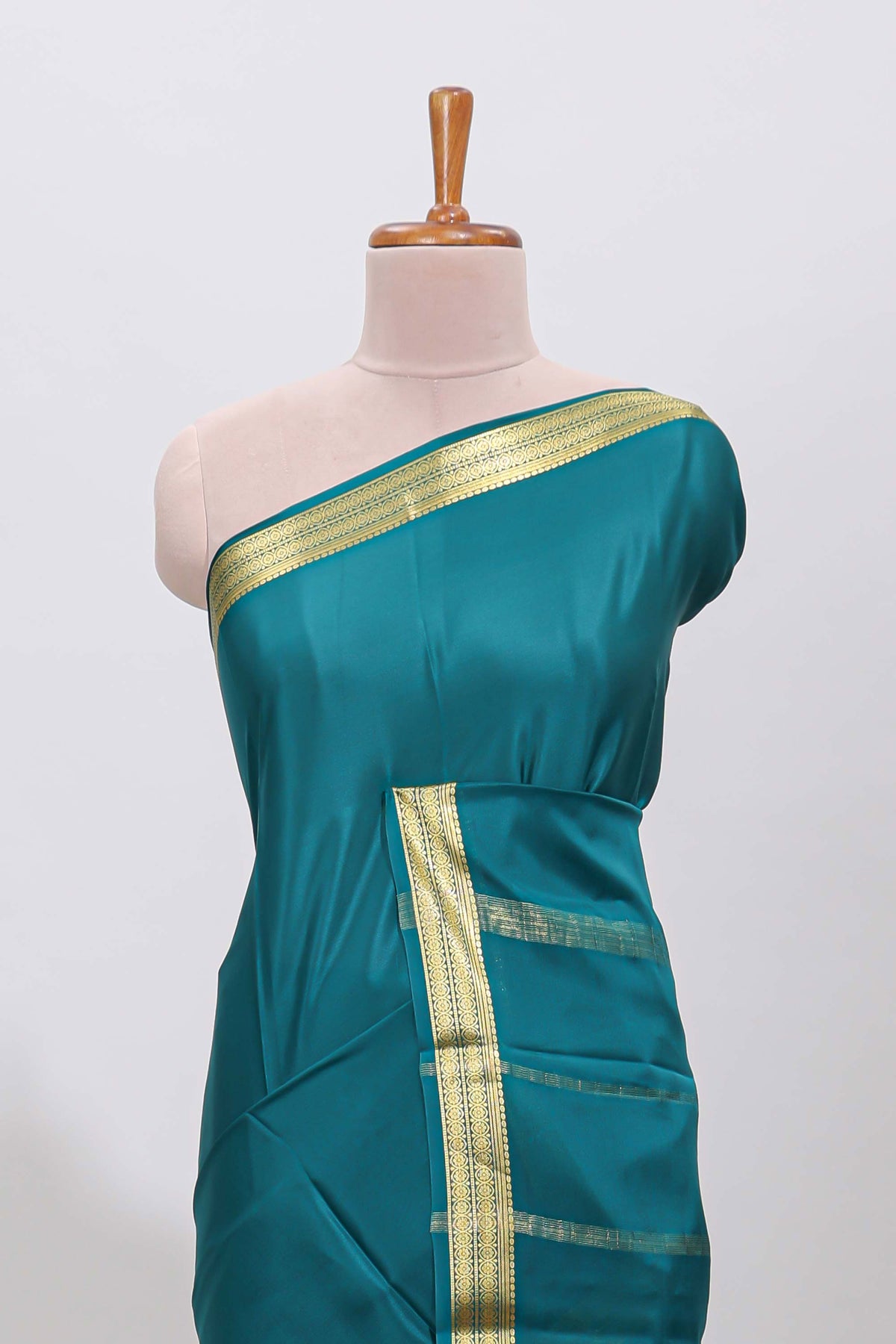 Teal blue plain pure mysore silk saree with self zari border and matching blouse