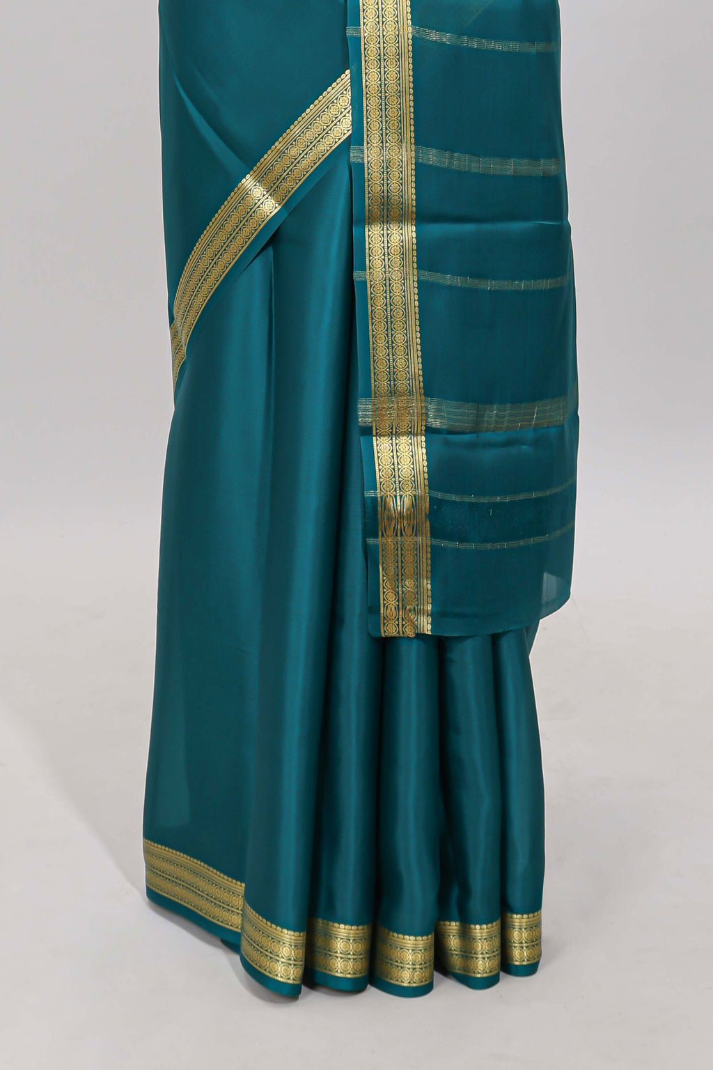 Teal blue plain pure mysore silk saree with self zari border and matching blouse