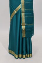 Teal blue plain pure mysore silk saree with self zari border and matching blouse