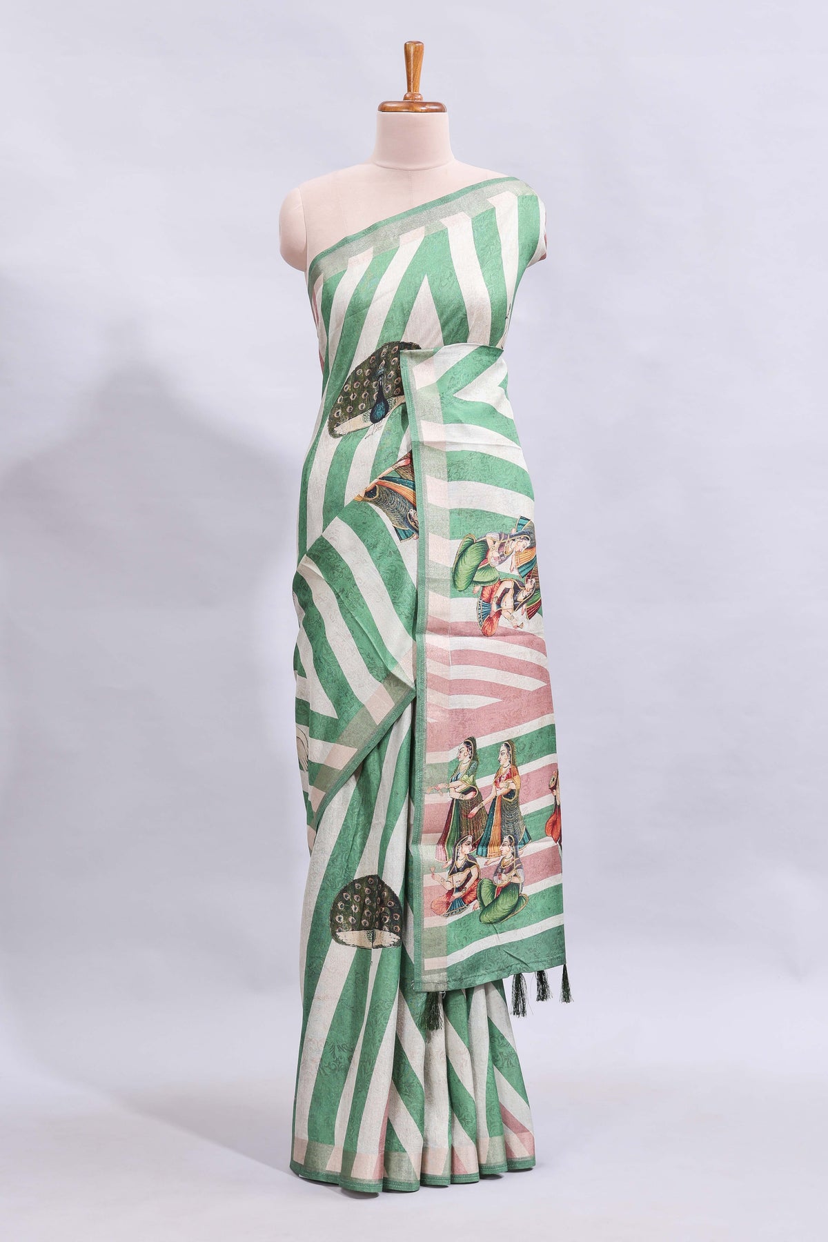 Off white & green striped peacock motifs design and self border and printed blouse