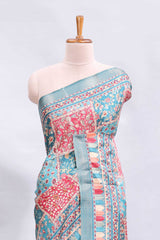 Blue floral design printed saree and self geometric design border and striped blouse