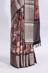 Maroon printed saree with traditional art motifs with contrast zari border and motifs blouse