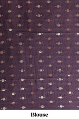 Maroon printed saree with traditional art motifs with contrast zari border and motifs blouse