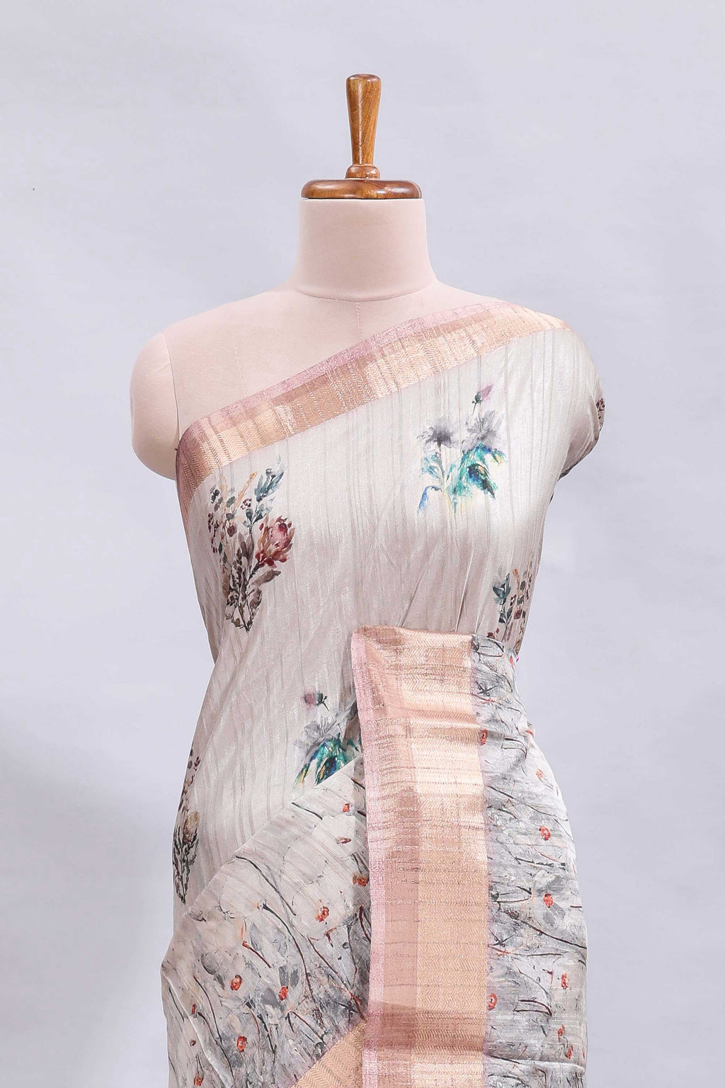 Grey floral design motifs printed saree with contrast zari border and matching blouse