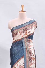 Blue striped floral design printed saree with cultural art motifs and designer tassel pallu