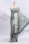 Beige floral design printed saree with contrast zari border and matching motifs blouse