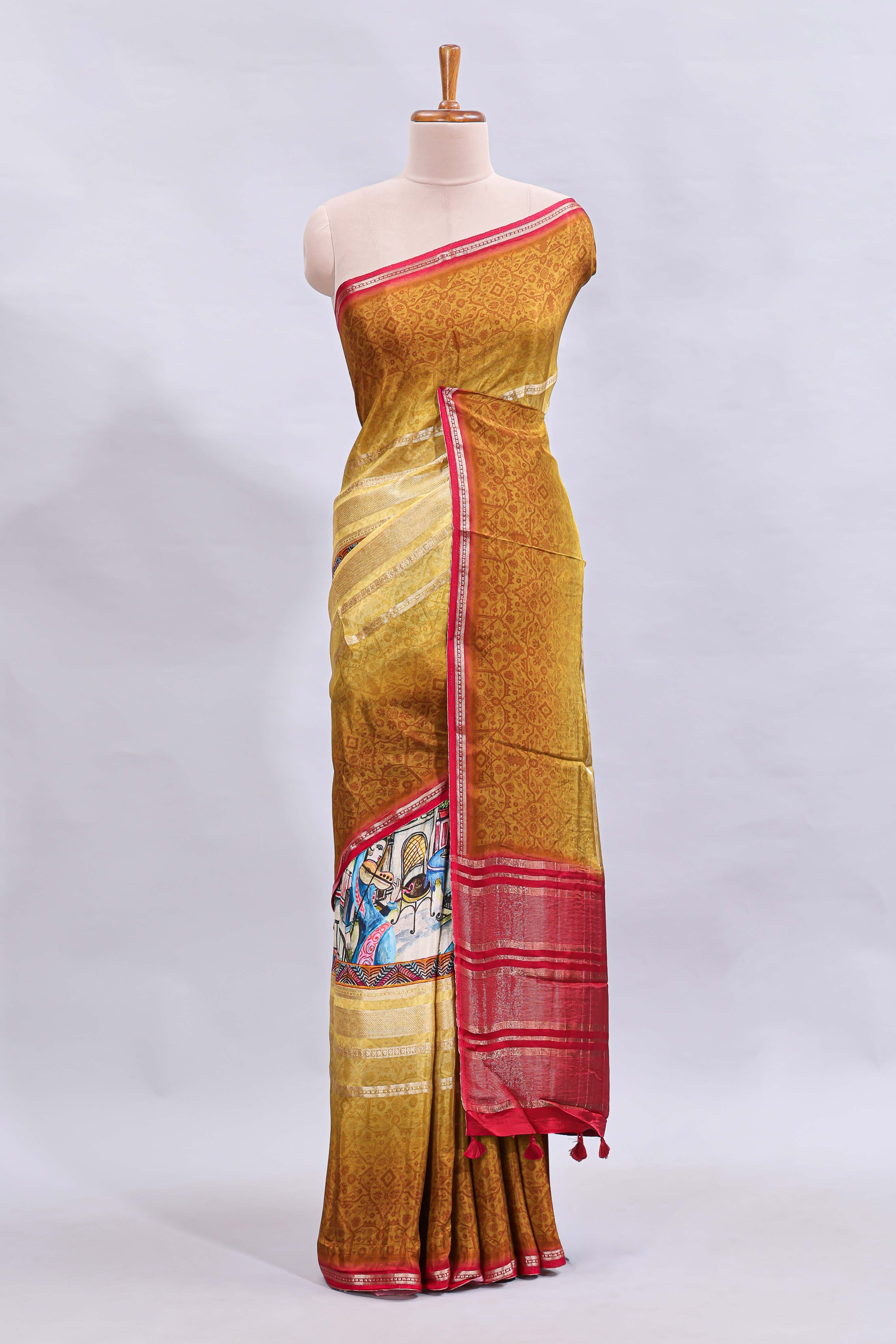 Multi color kalamkari style printed saree with traditional art design with contrast zari border and motifs blouse