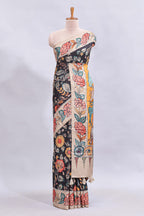 Black kalamkari style floral design printed saree with contrast border and blouse