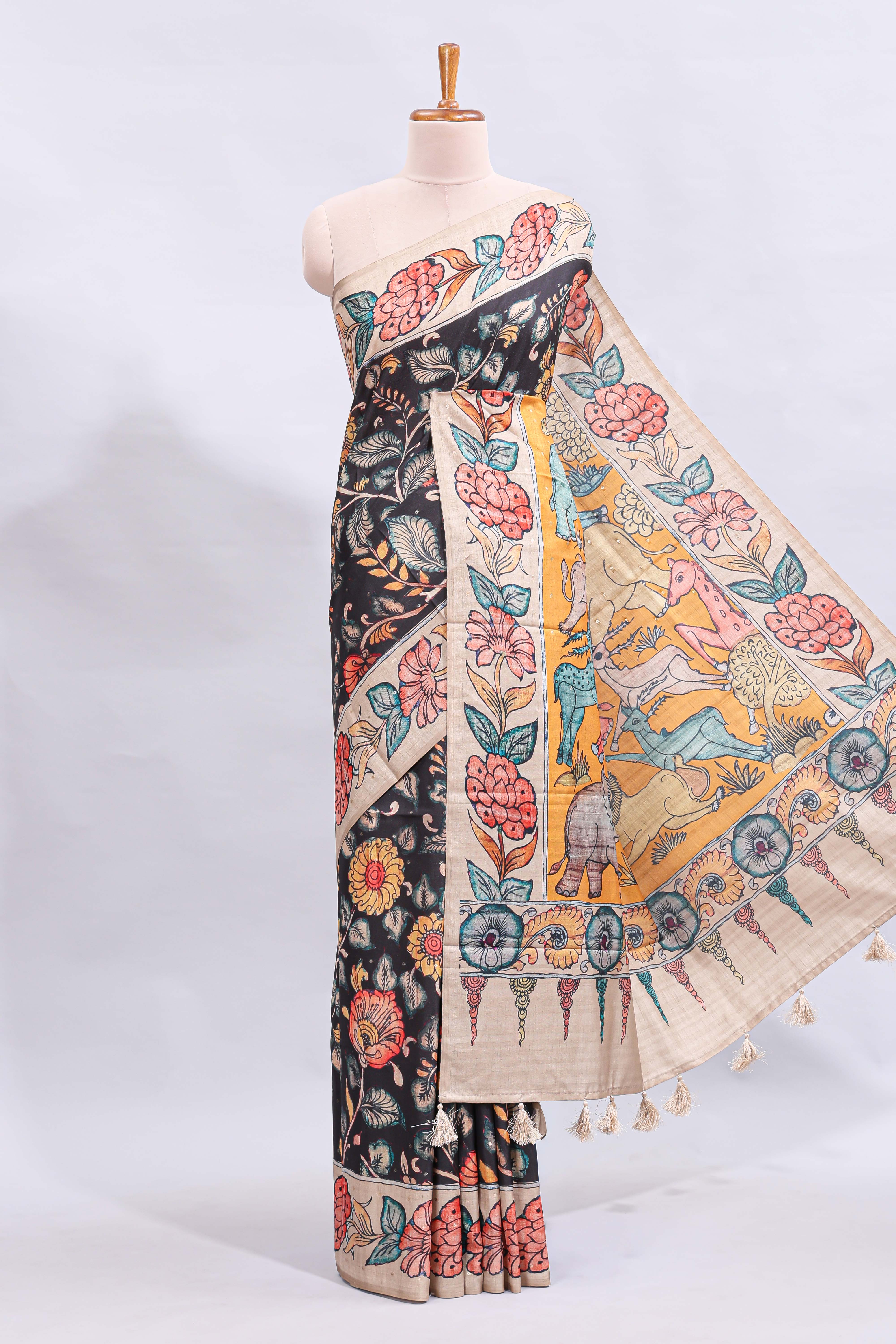 Black kalamkari style floral design printed saree with contrast border and blouse