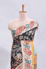 Black kalamkari style floral design printed saree with contrast border and blouse