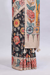 Black kalamkari style floral design printed saree with contrast border and blouse